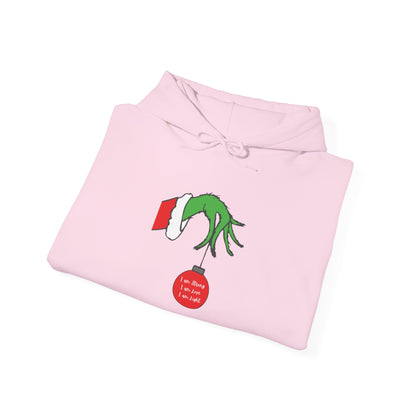 Grinch Hand Holding Ornament Hoodie